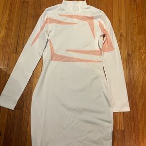 Dress with Peach Colored Mesh Cut-Outs.